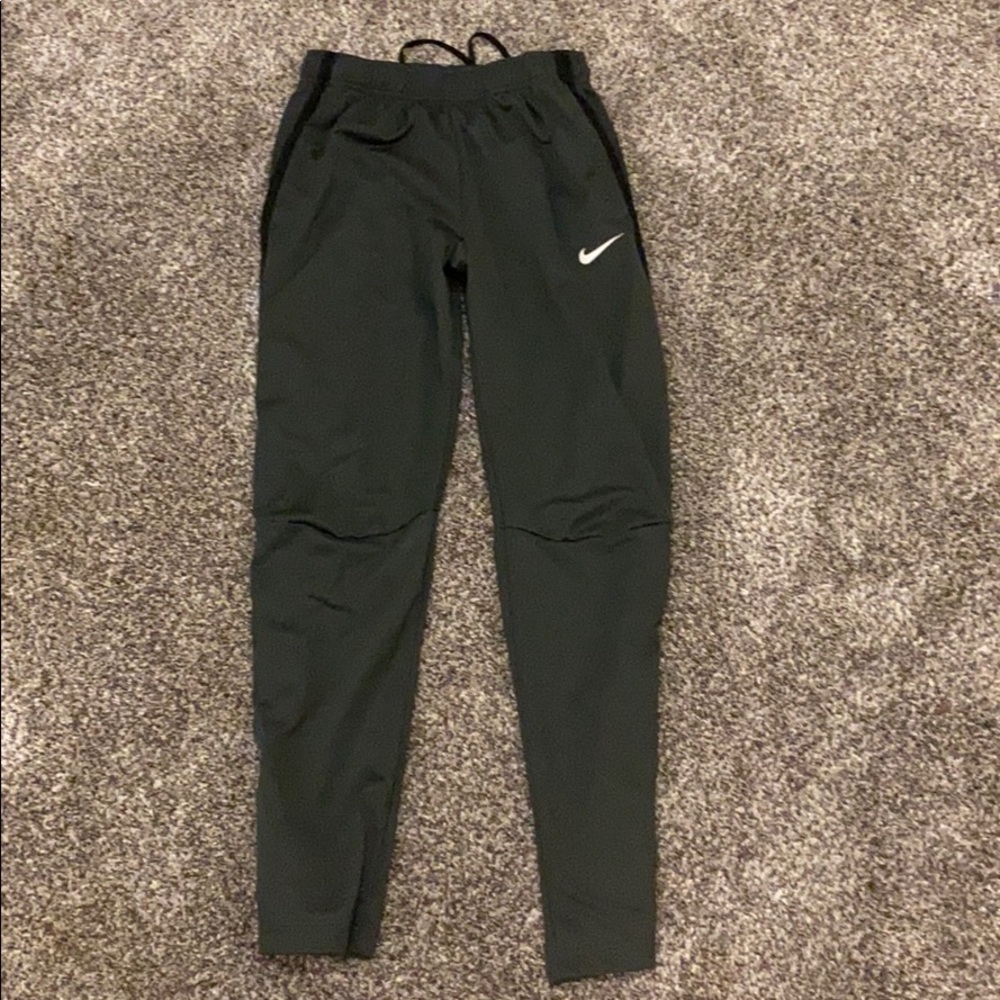 Small Nike gray  sweatpants with zipper on ankle